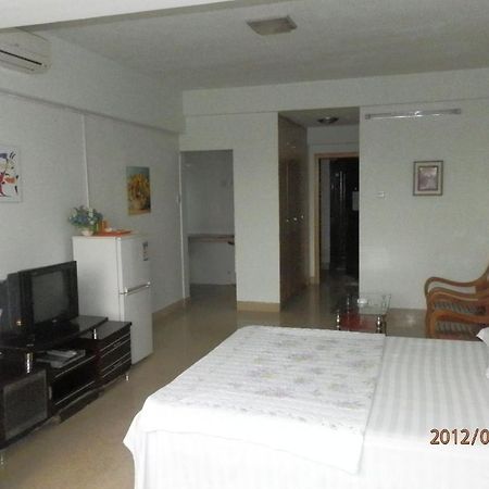 Xingfu Hotel Nanning Zimmer foto